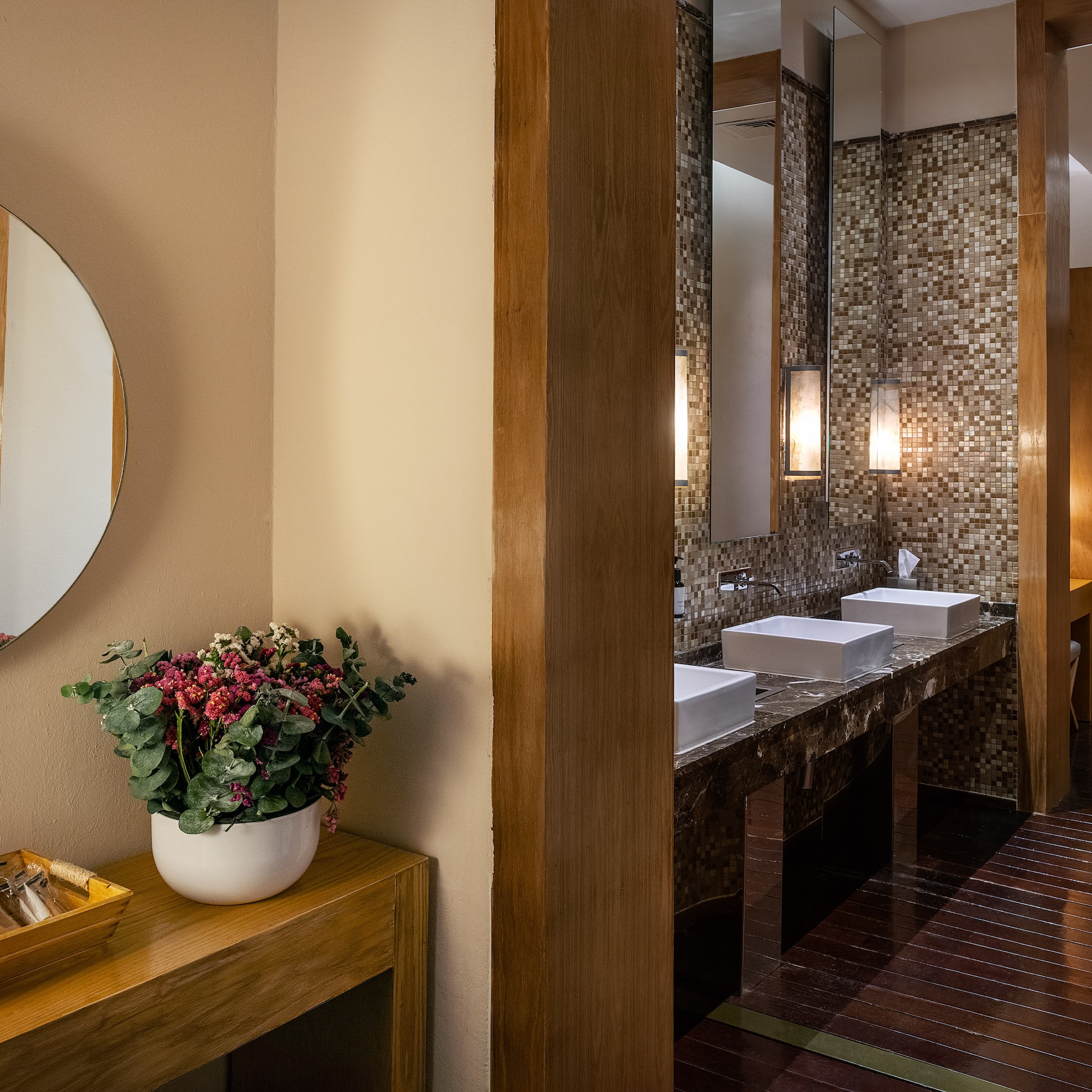 a bathroom with a mirror and sink