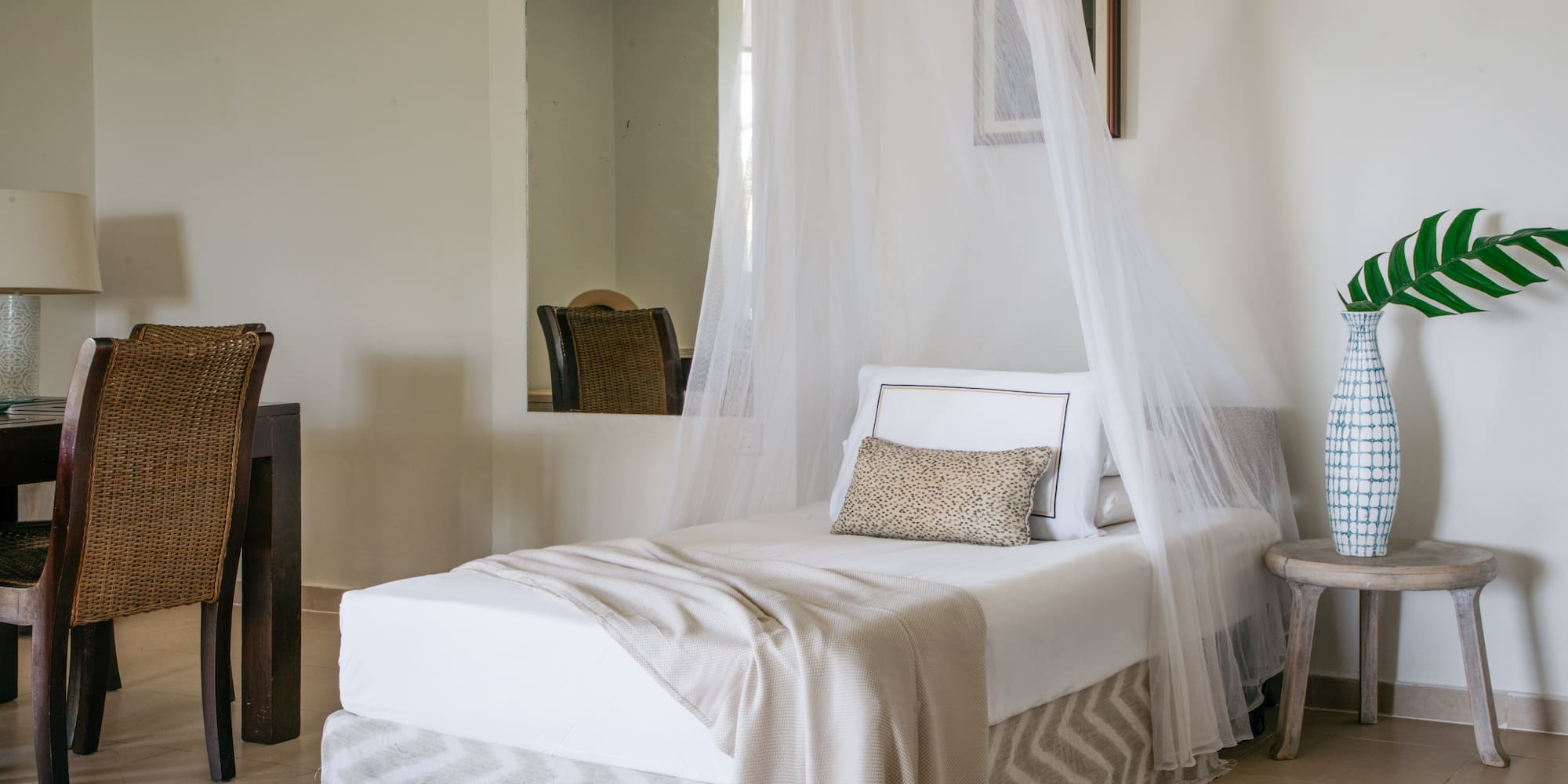 a bed with a canopy over it