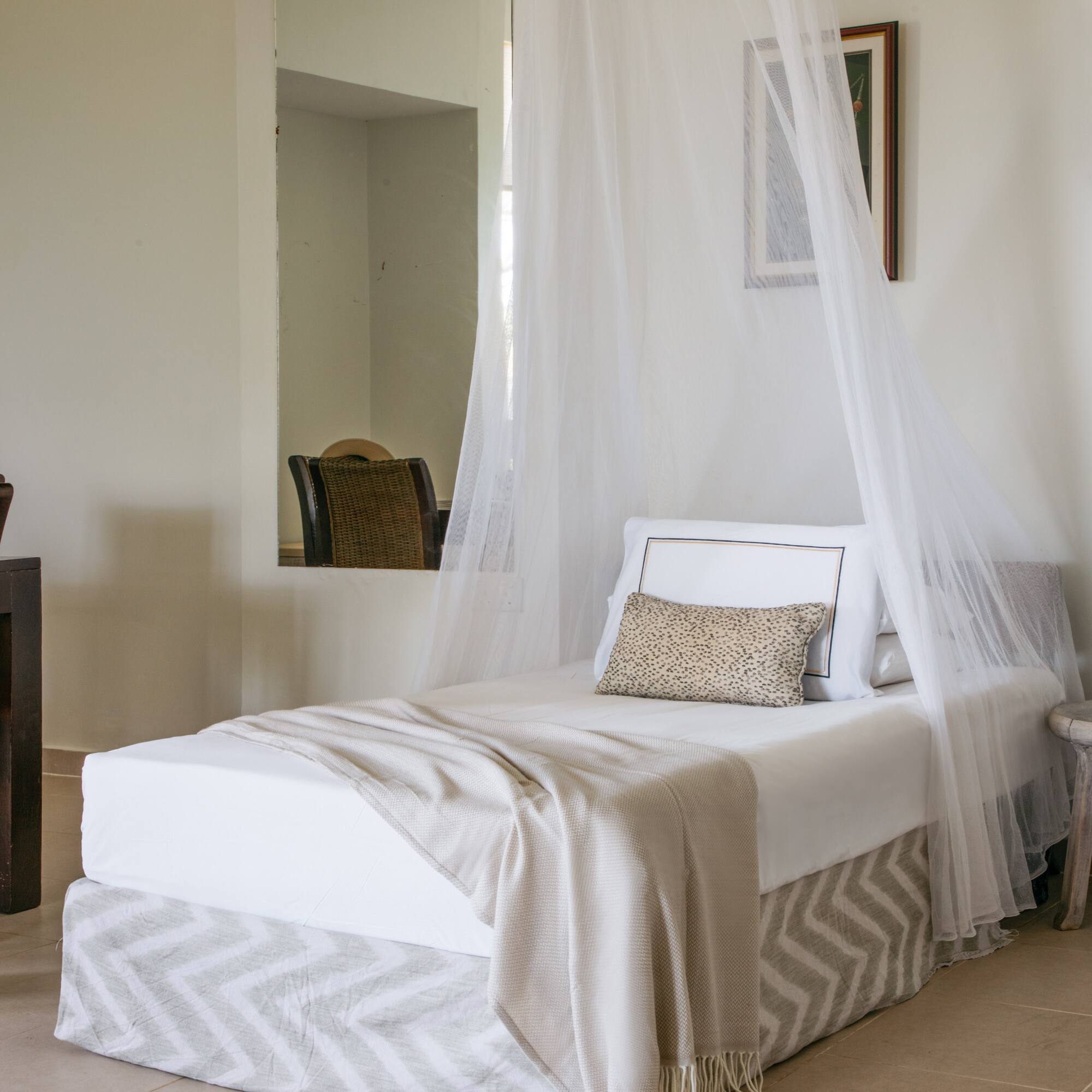 a bed with a canopy over it