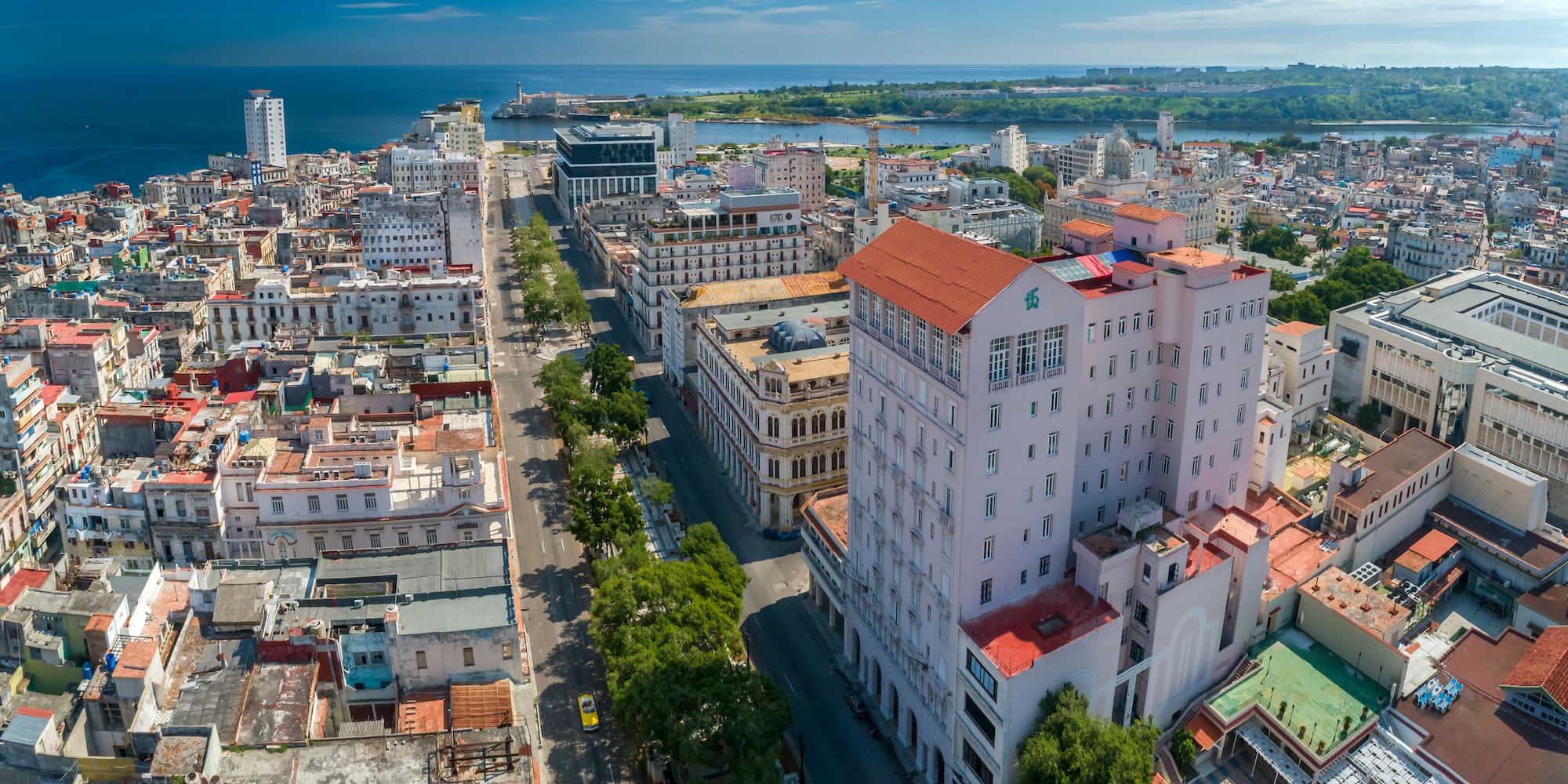 a city with many buildings and a body of water
