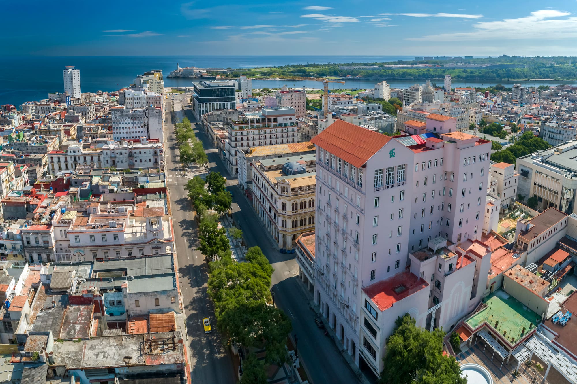 a city with many buildings and a body of water