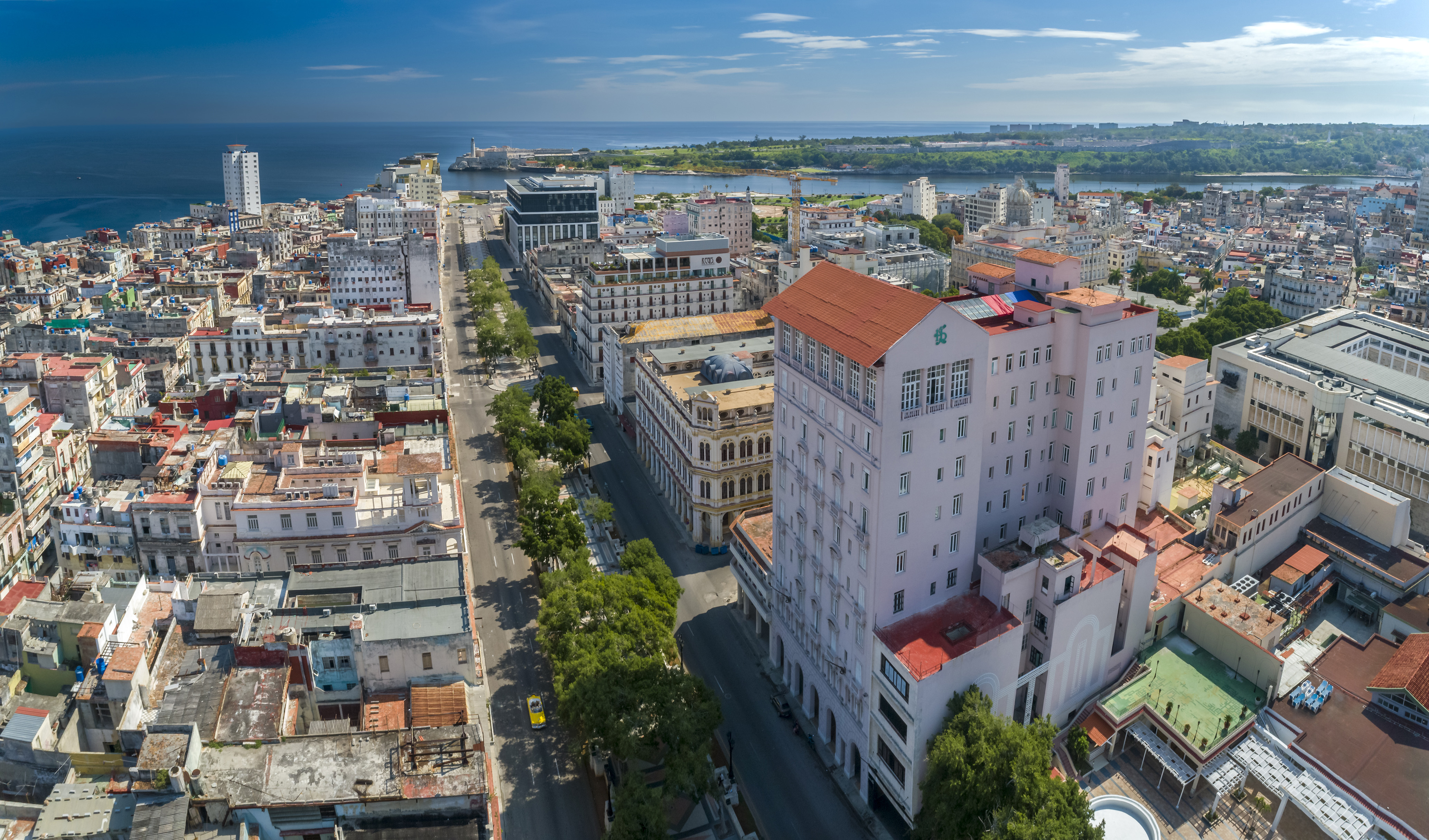 a city with many buildings and a body of water