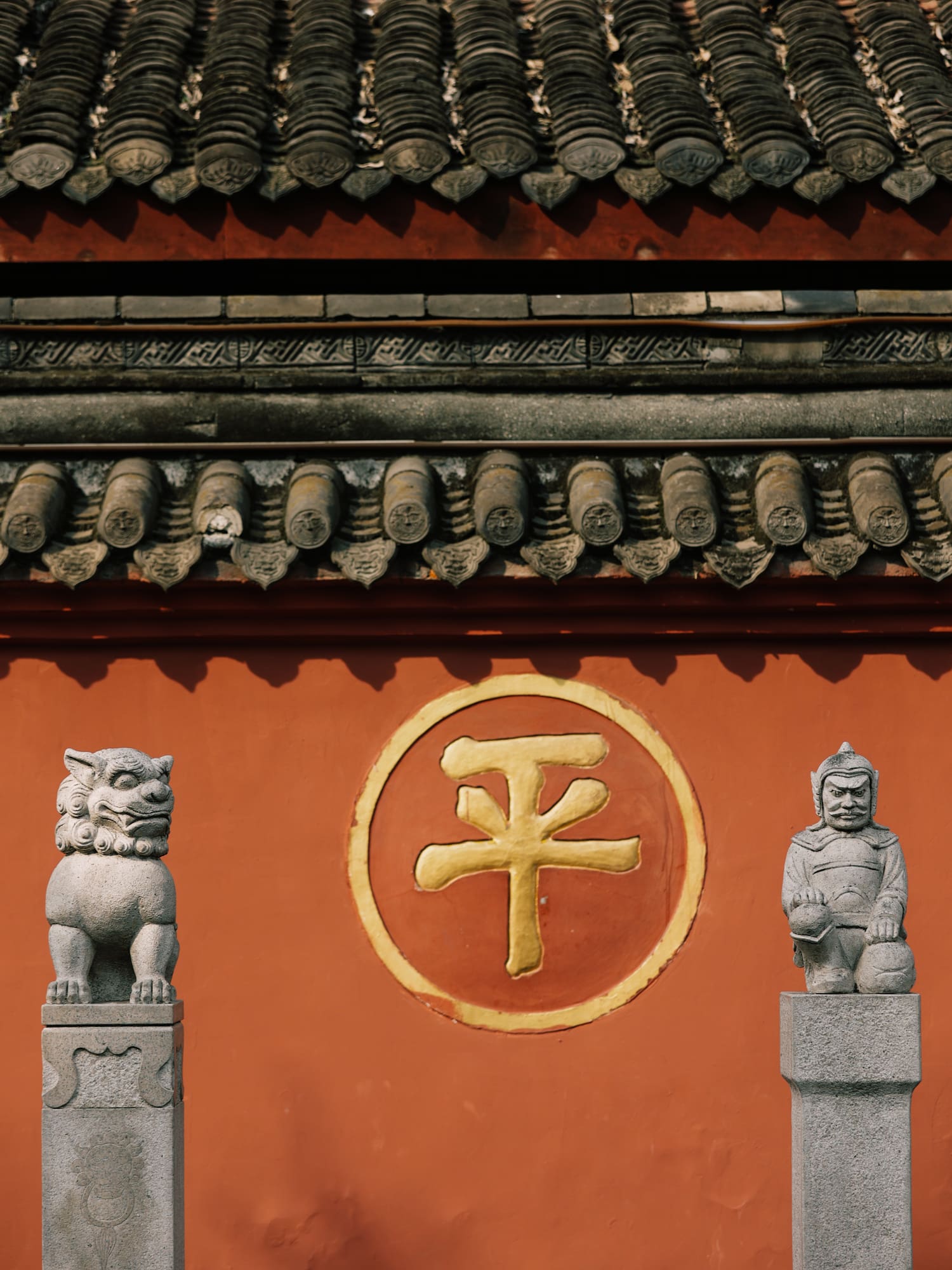 a stone statues on a wall