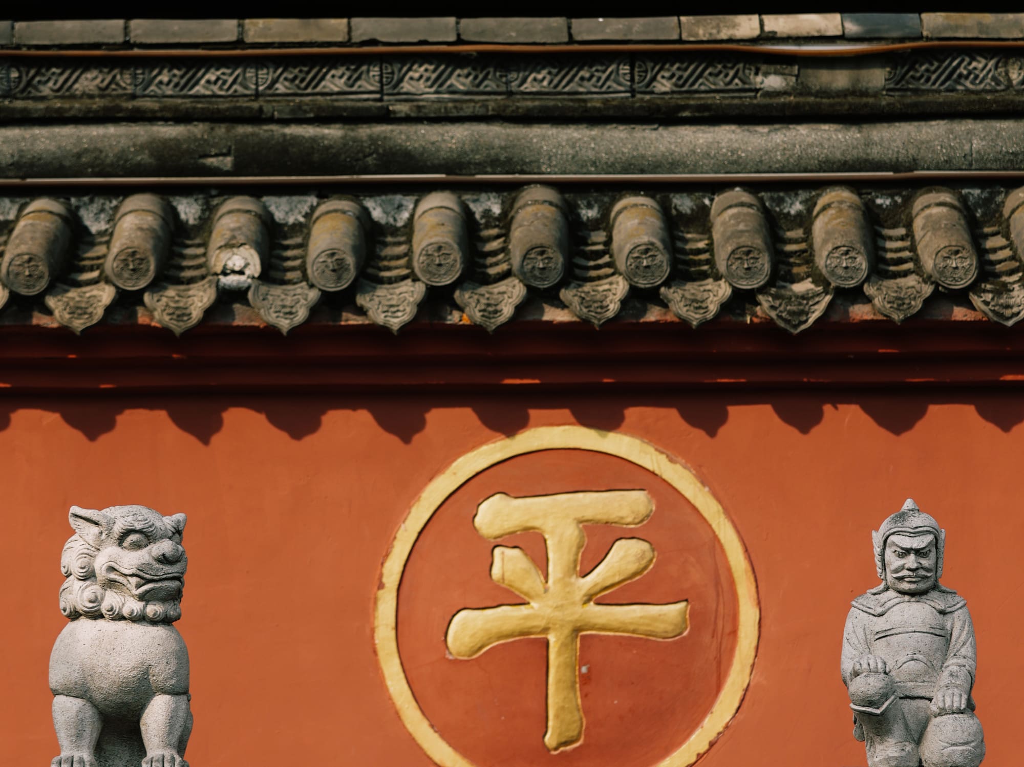 a stone statues on a wall