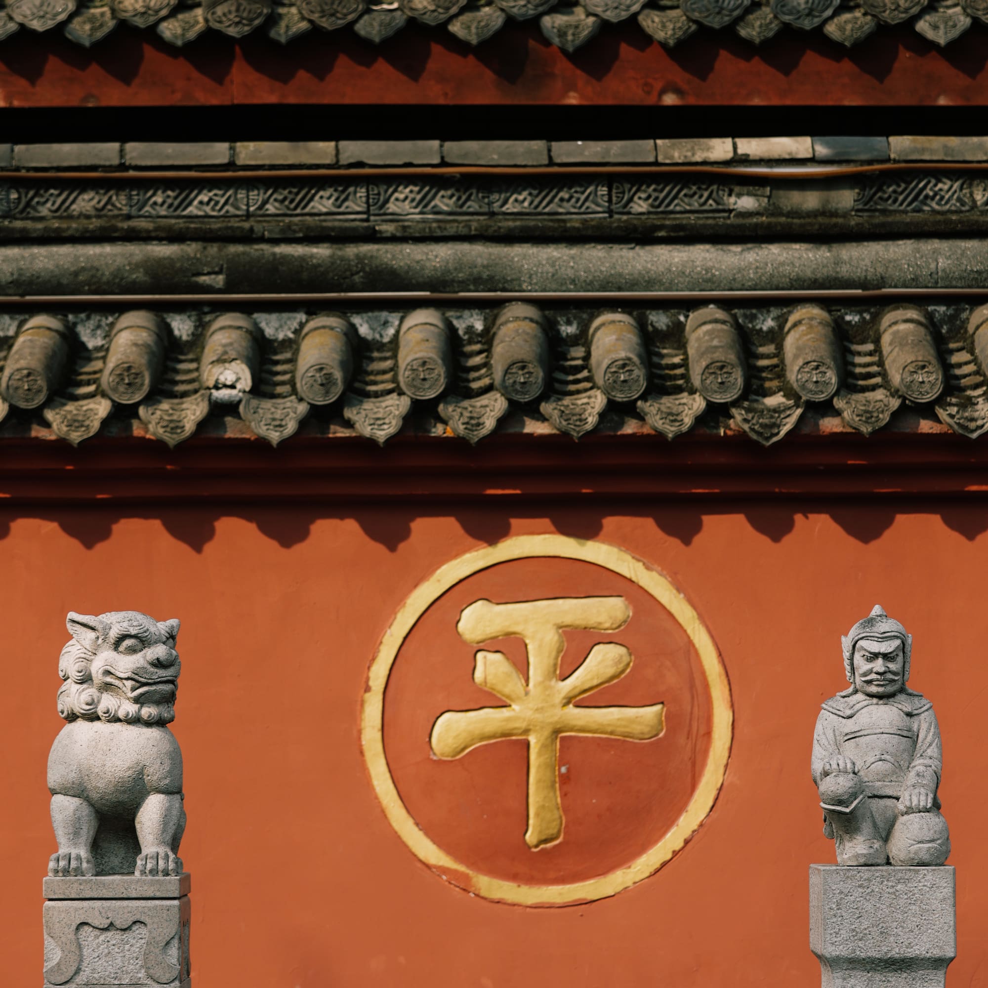 a stone statues on a wall