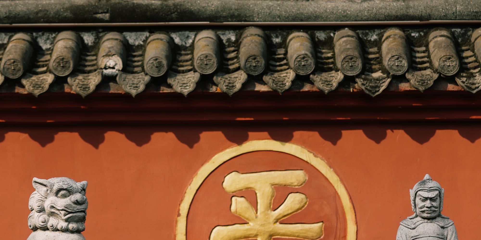 a stone statues on a wall