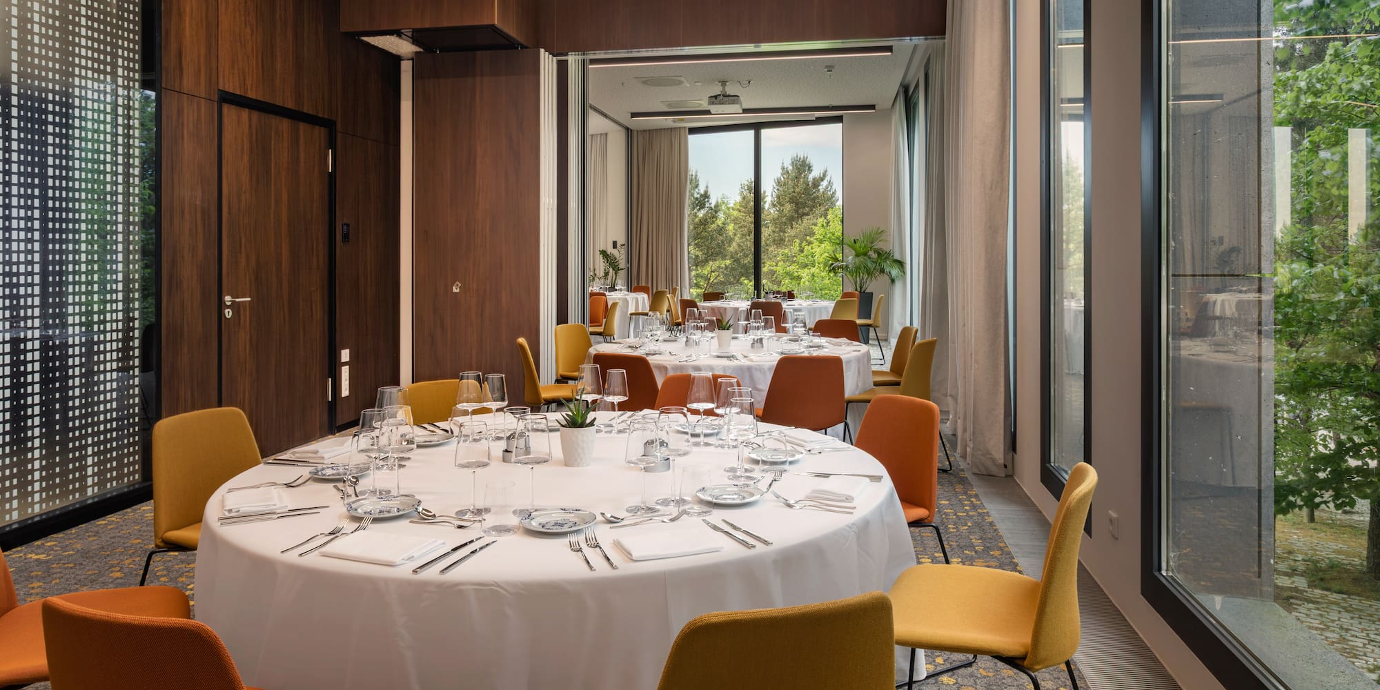 a room with tables and chairs