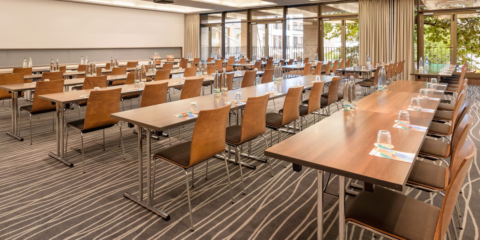 a room with tables and chairs