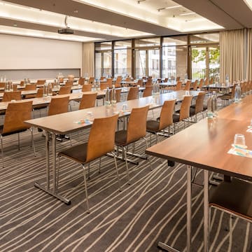 a room with tables and chairs