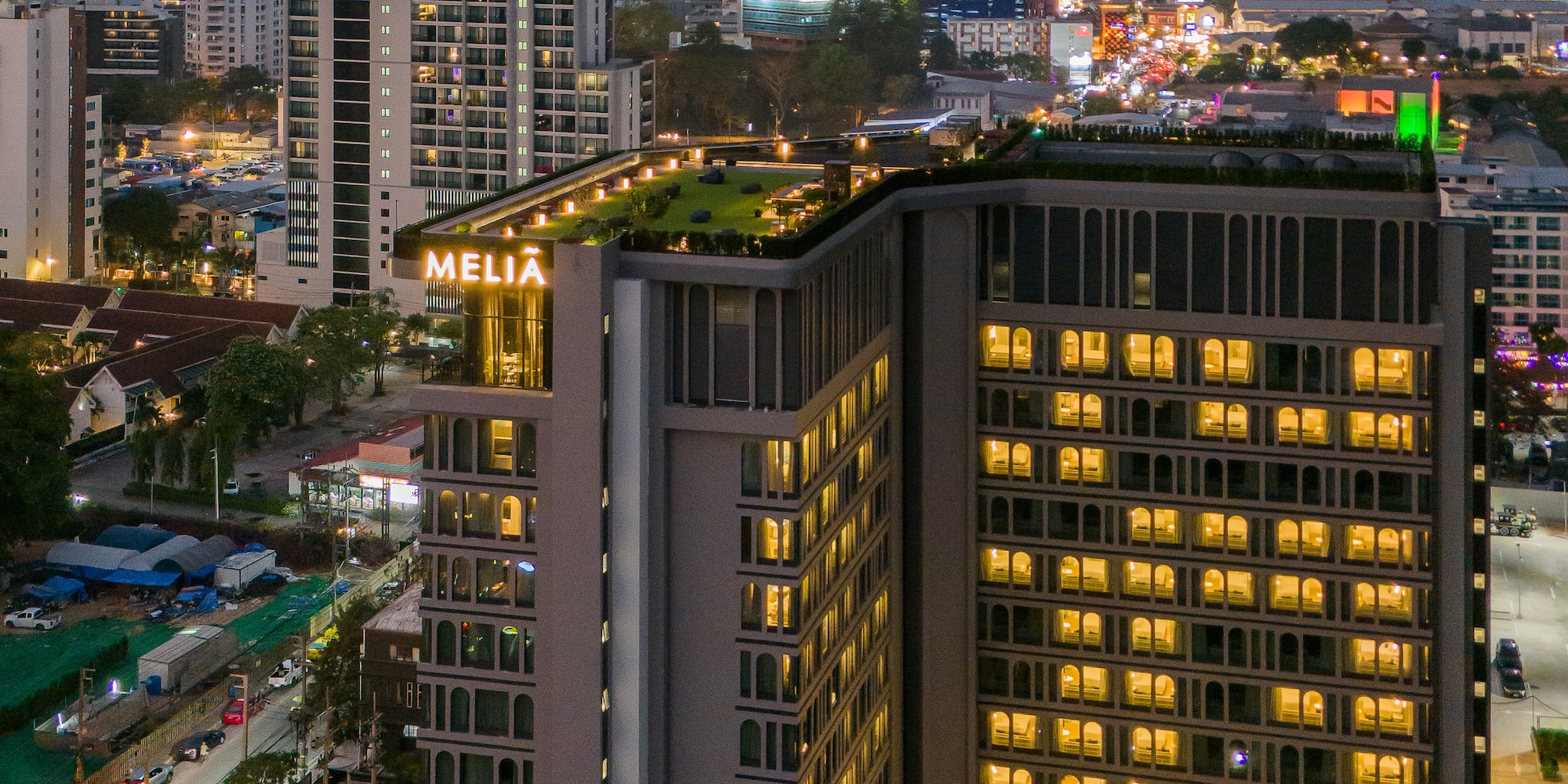 a city with many lights on the building