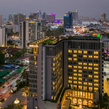 a city with many lights on the building