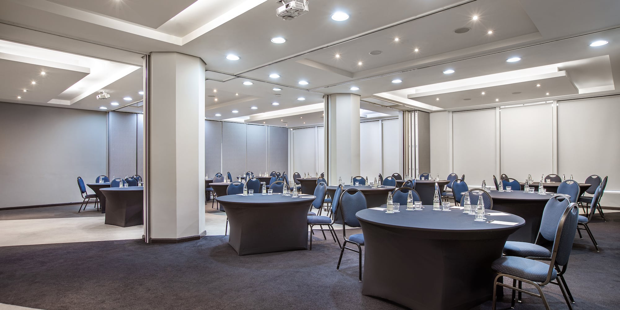 a room with tables and chairs