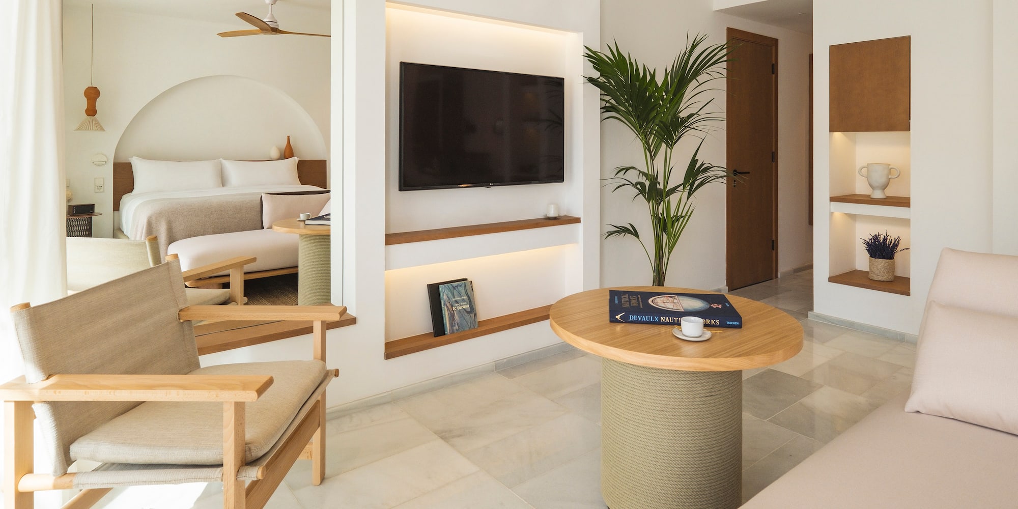 a room with a television and a table