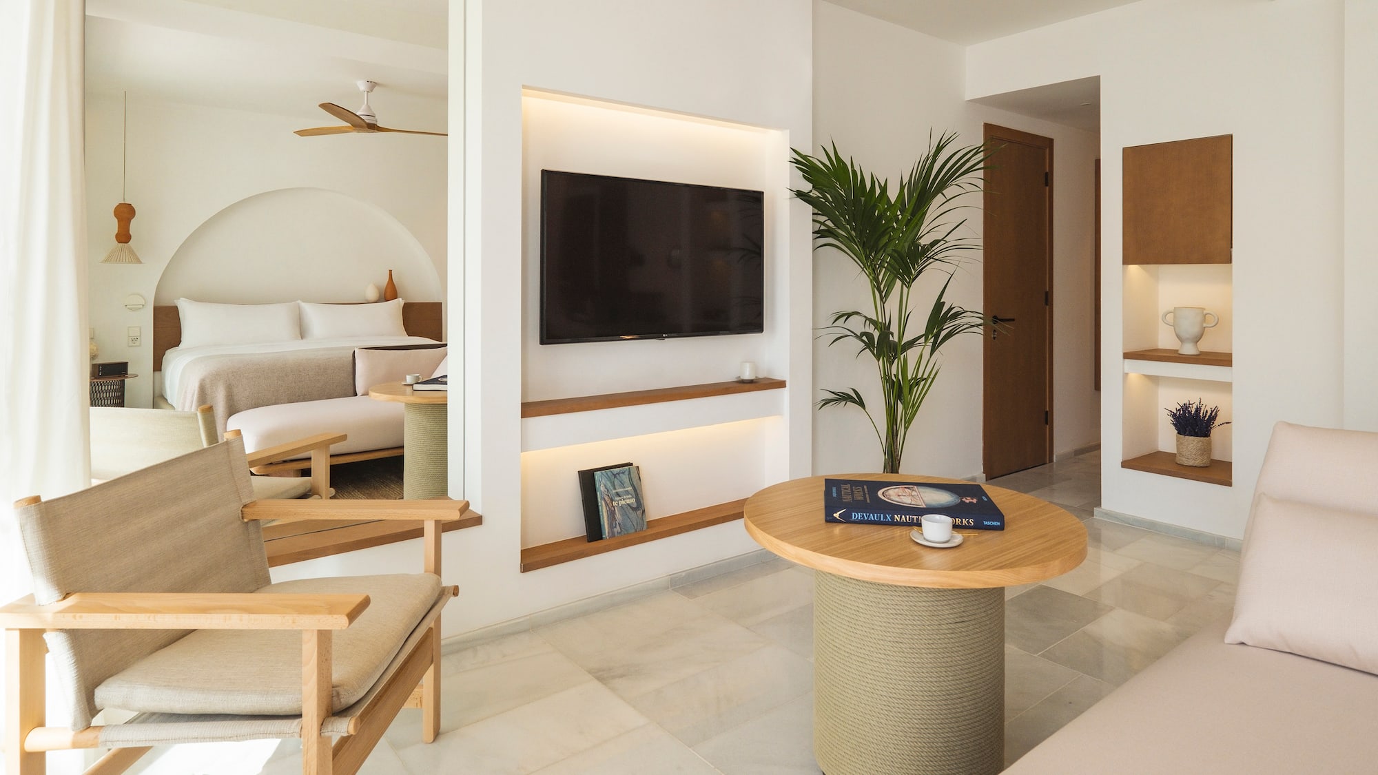 a room with a television and a table