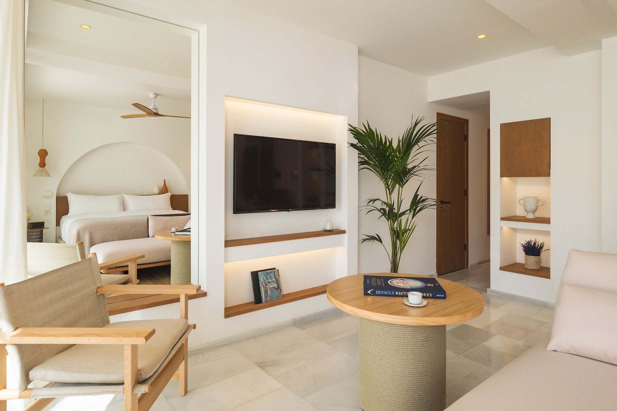 a room with a television and a table