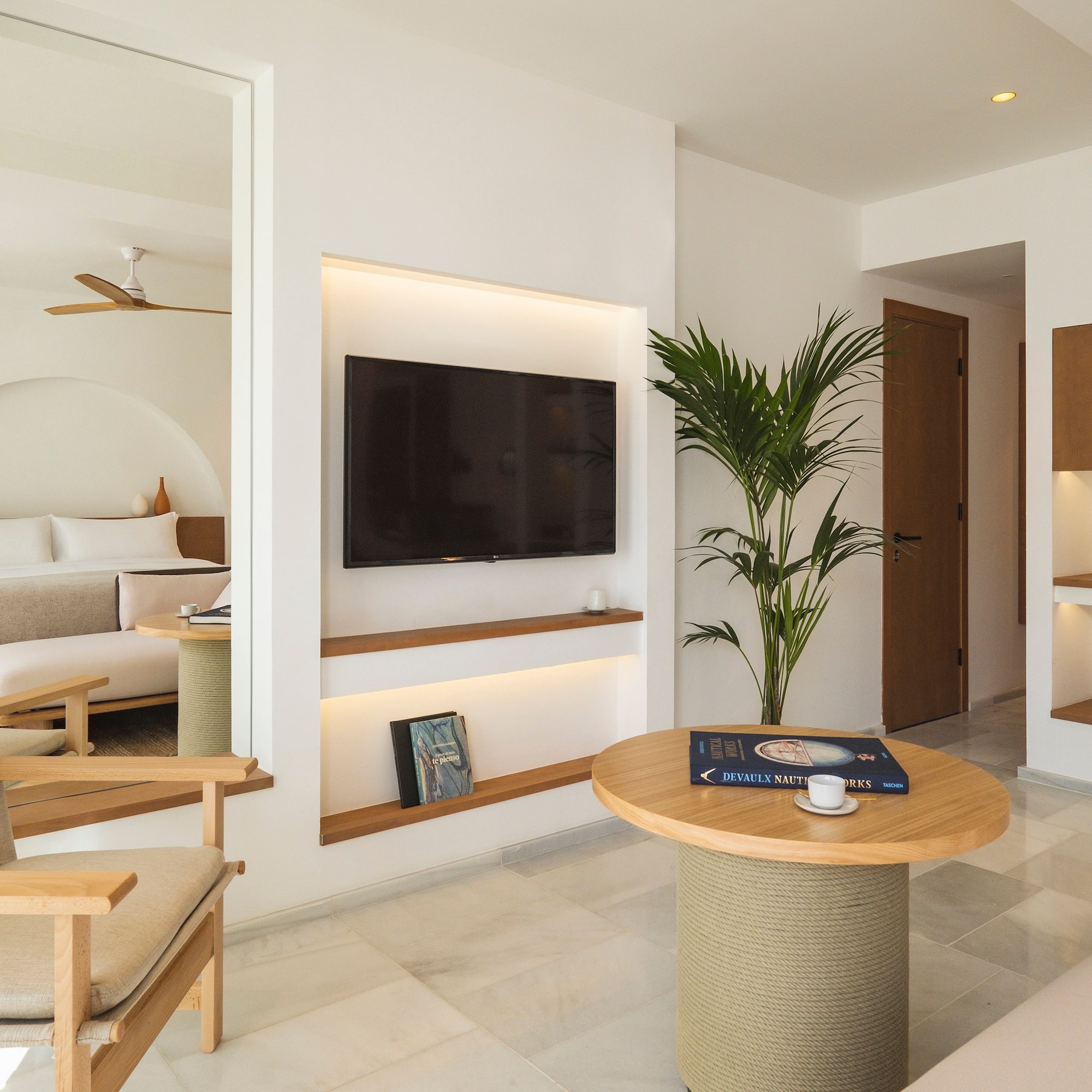 a room with a television and a table