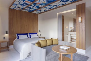 a room with a bed and a couch