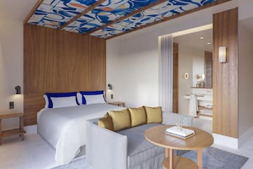 a room with a bed and a couch