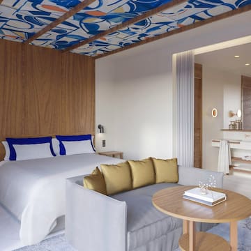 a room with a bed and a couch