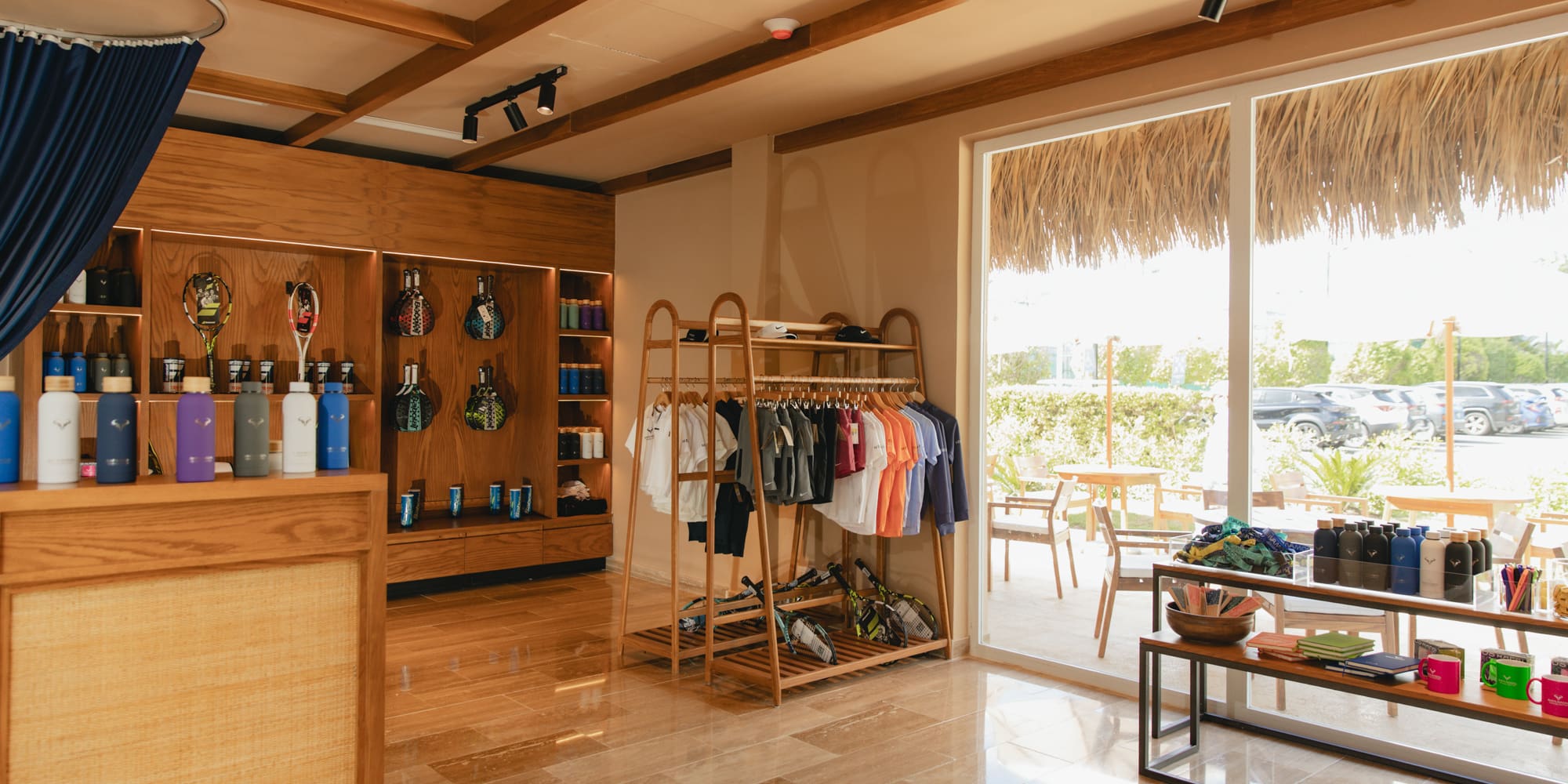 a store with a shelf and shelves with clothes