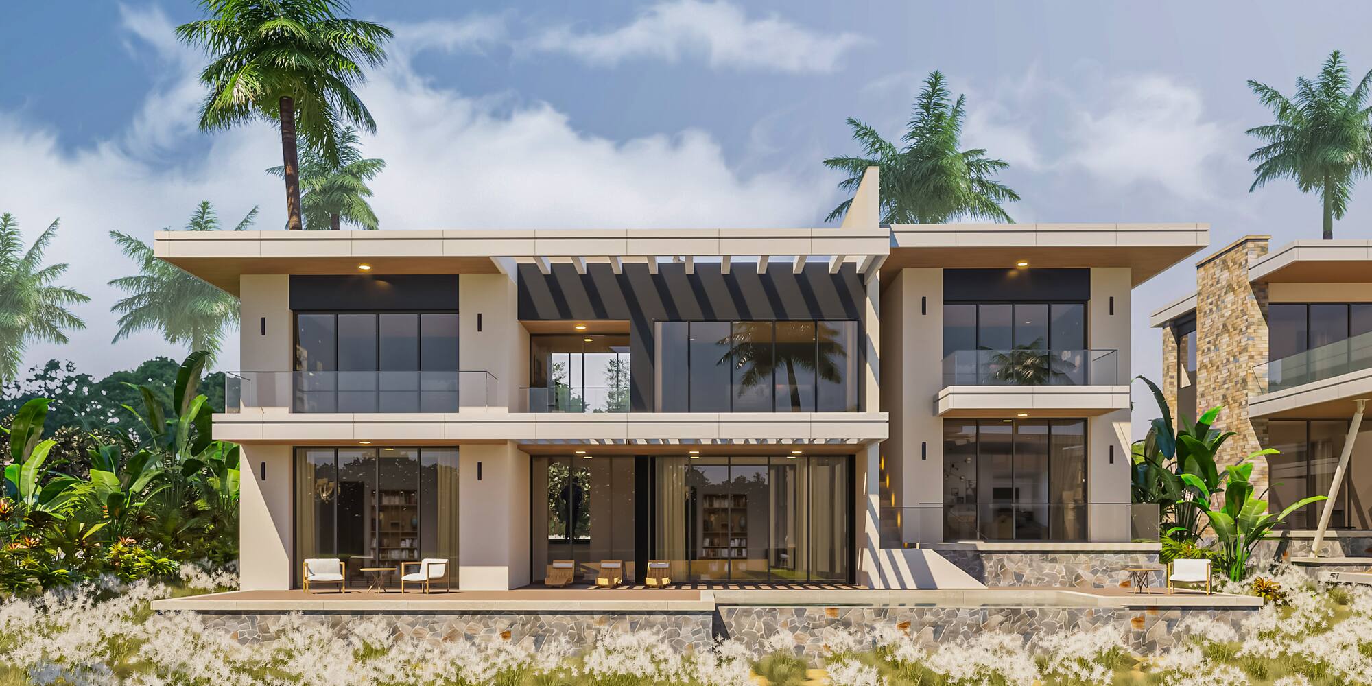 a building with a beach and palm trees