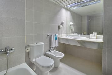 a bathroom with a sink and toilet