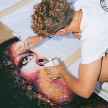 a person painting a picture