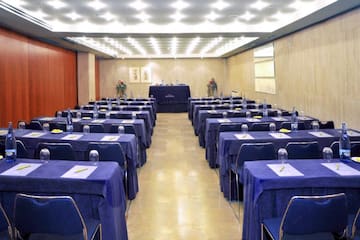 a room with tables and chairs