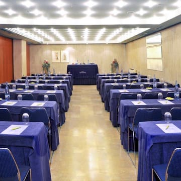 a room with tables and chairs