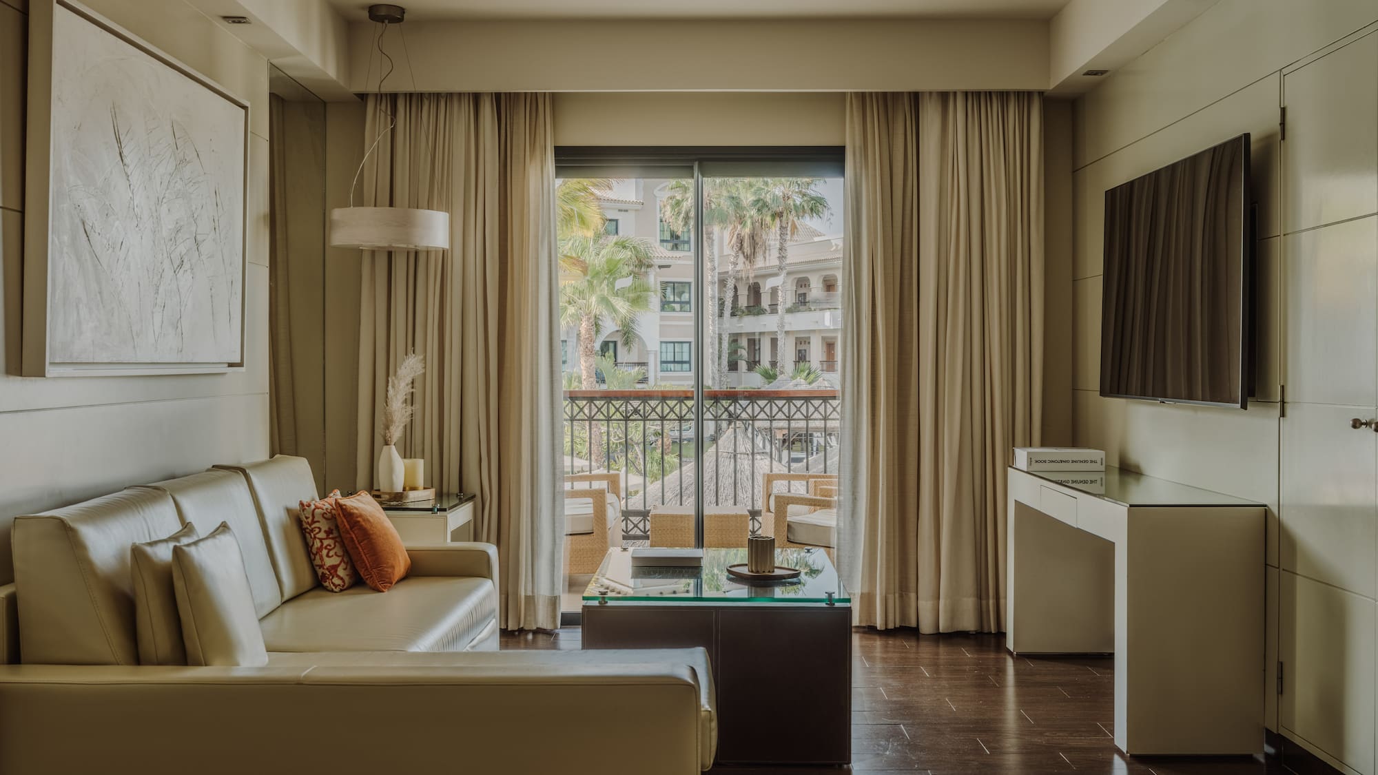 a living room with a couch and a television