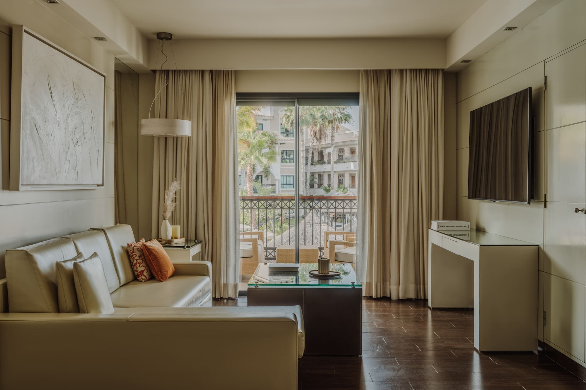 a living room with a couch and a television