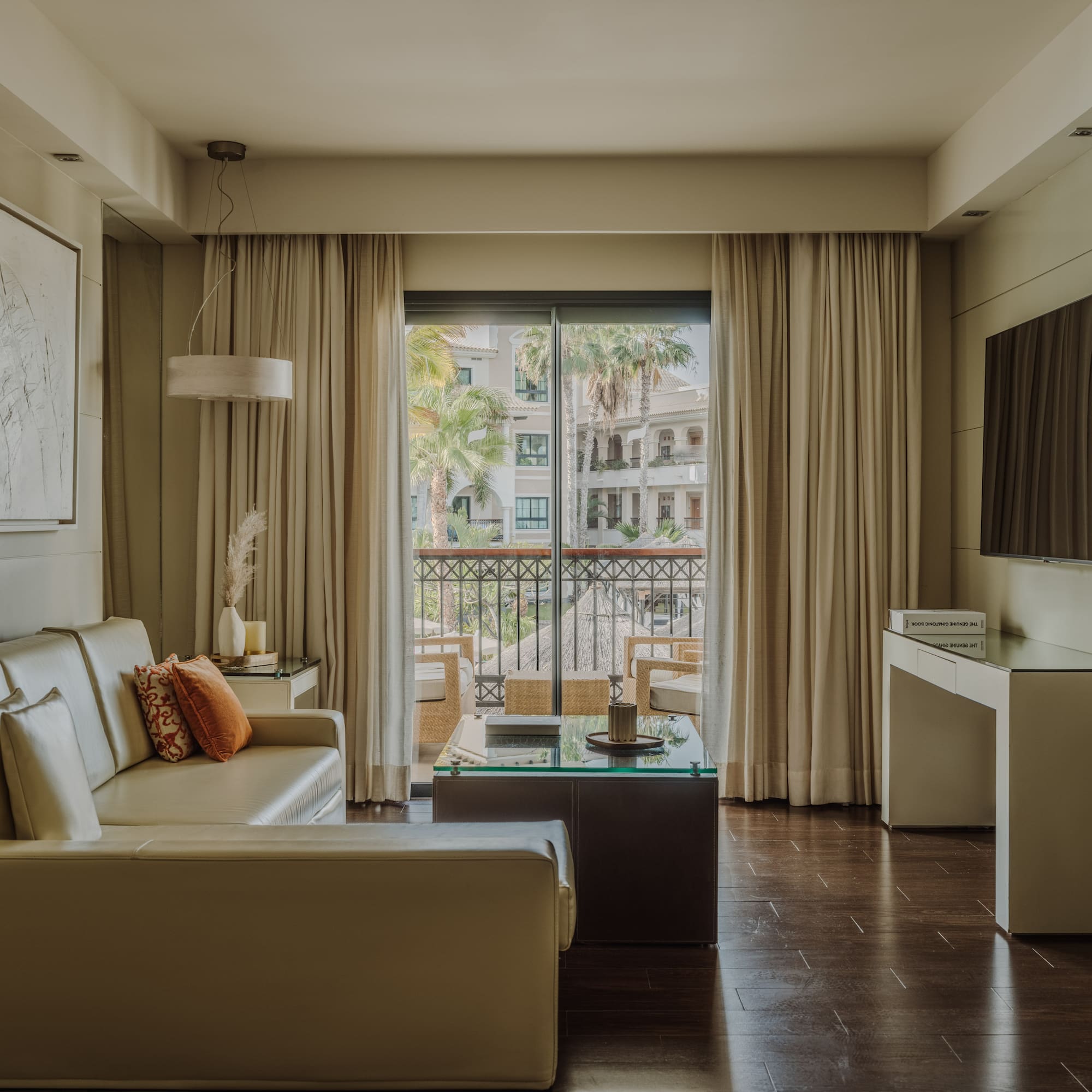 a living room with a couch and a television