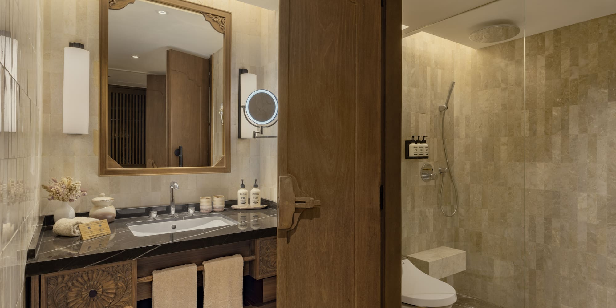 a bathroom with a mirror and sink