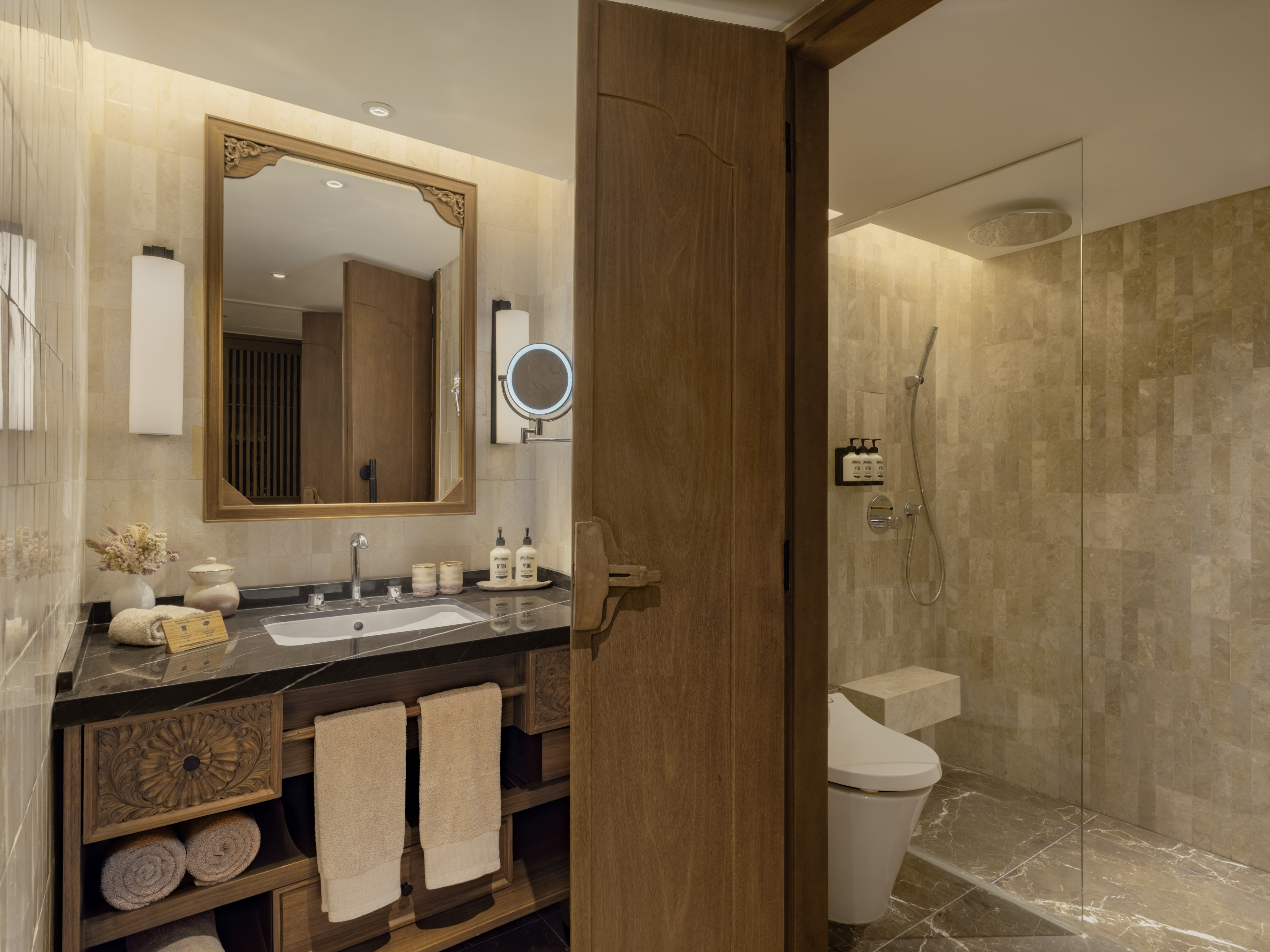 a bathroom with a mirror and sink