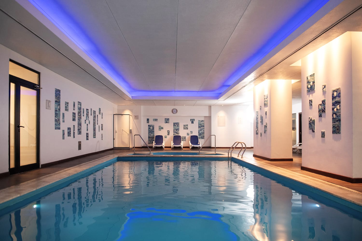 a swimming pool inside a building