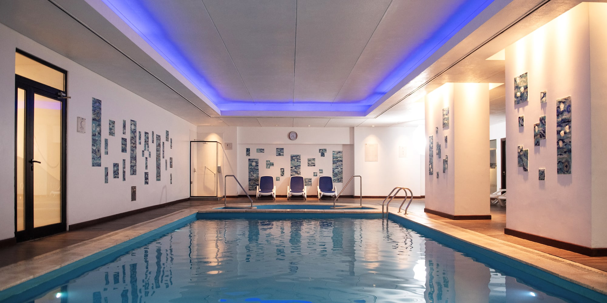 a swimming pool inside a building