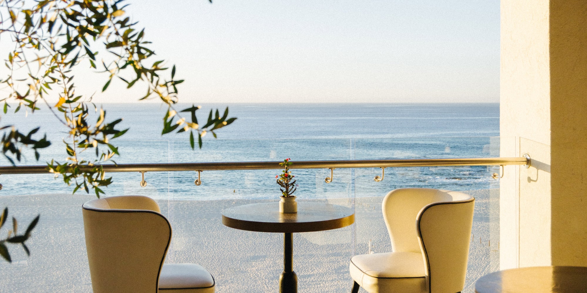 a table and chairs by a window