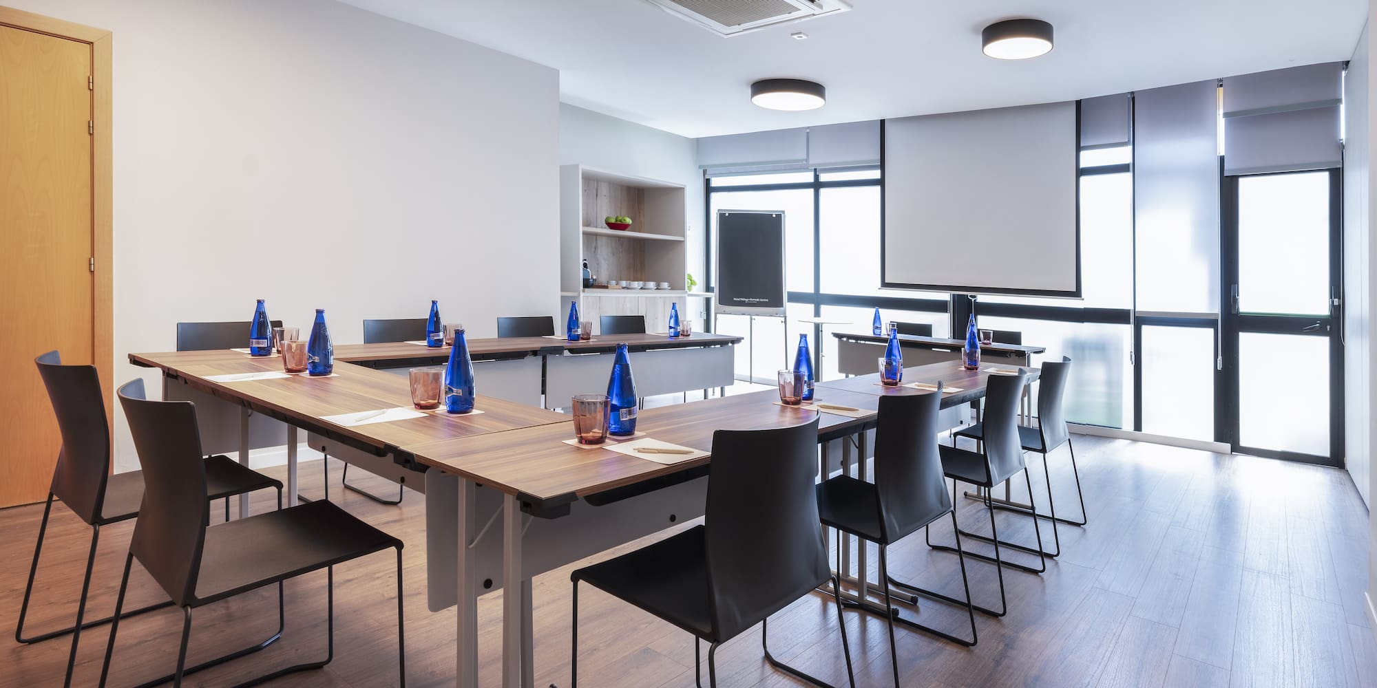 a room with a table and chairs