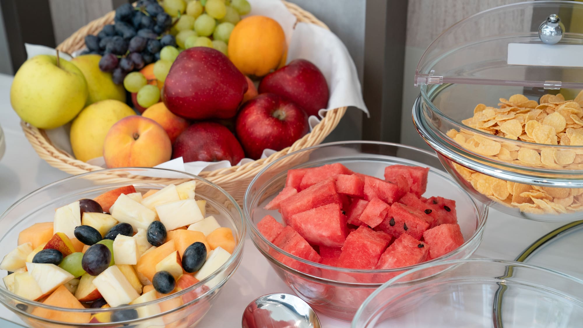 a group of bowls of fruit