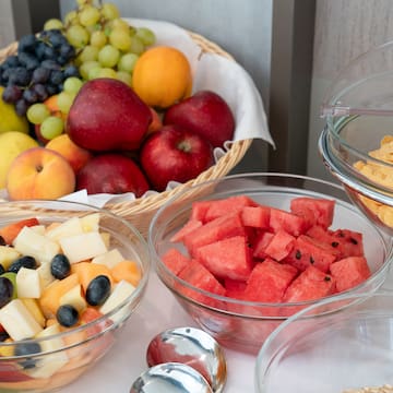 a group of bowls of fruit
