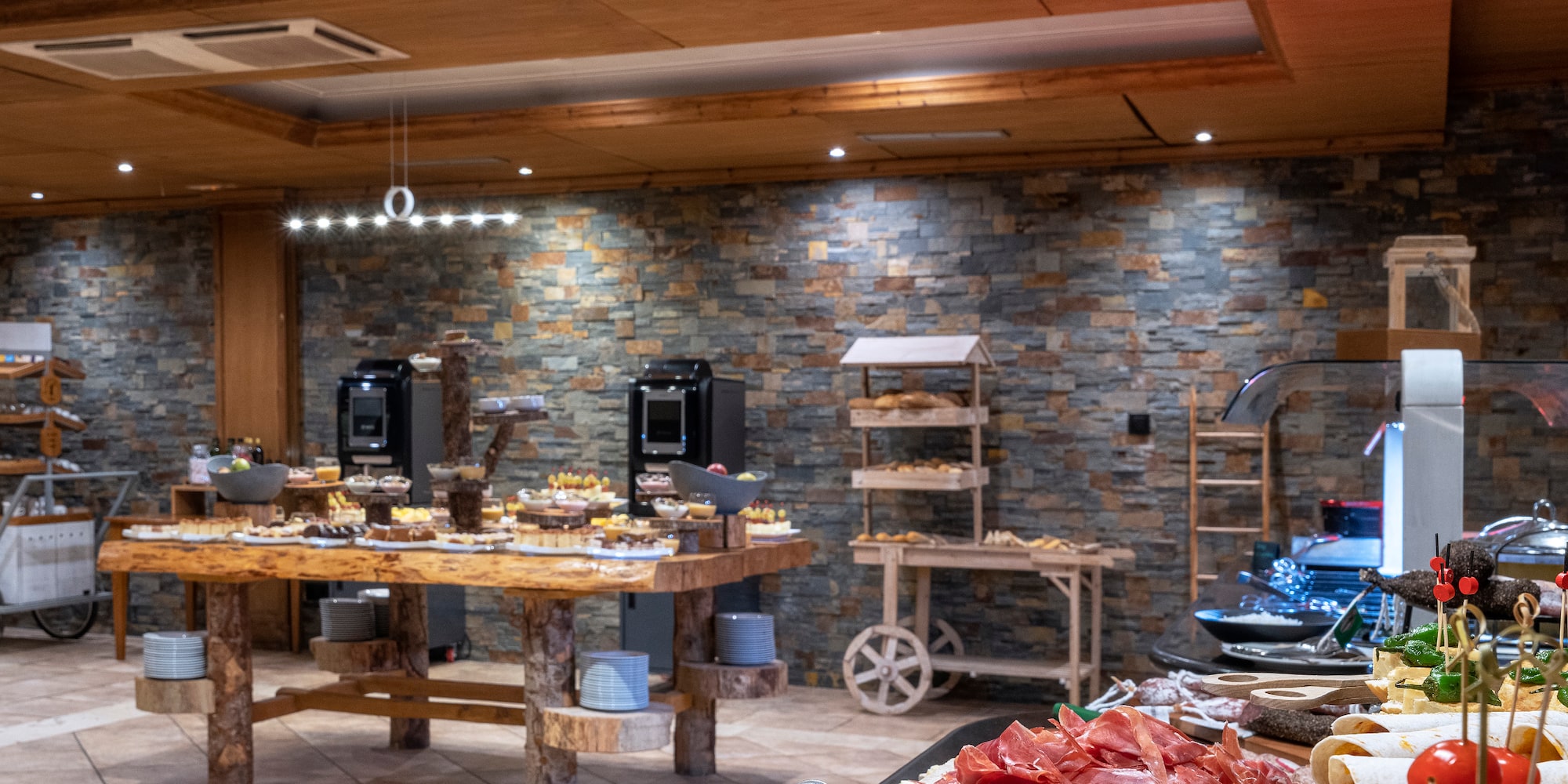 a large room with food and a large table
