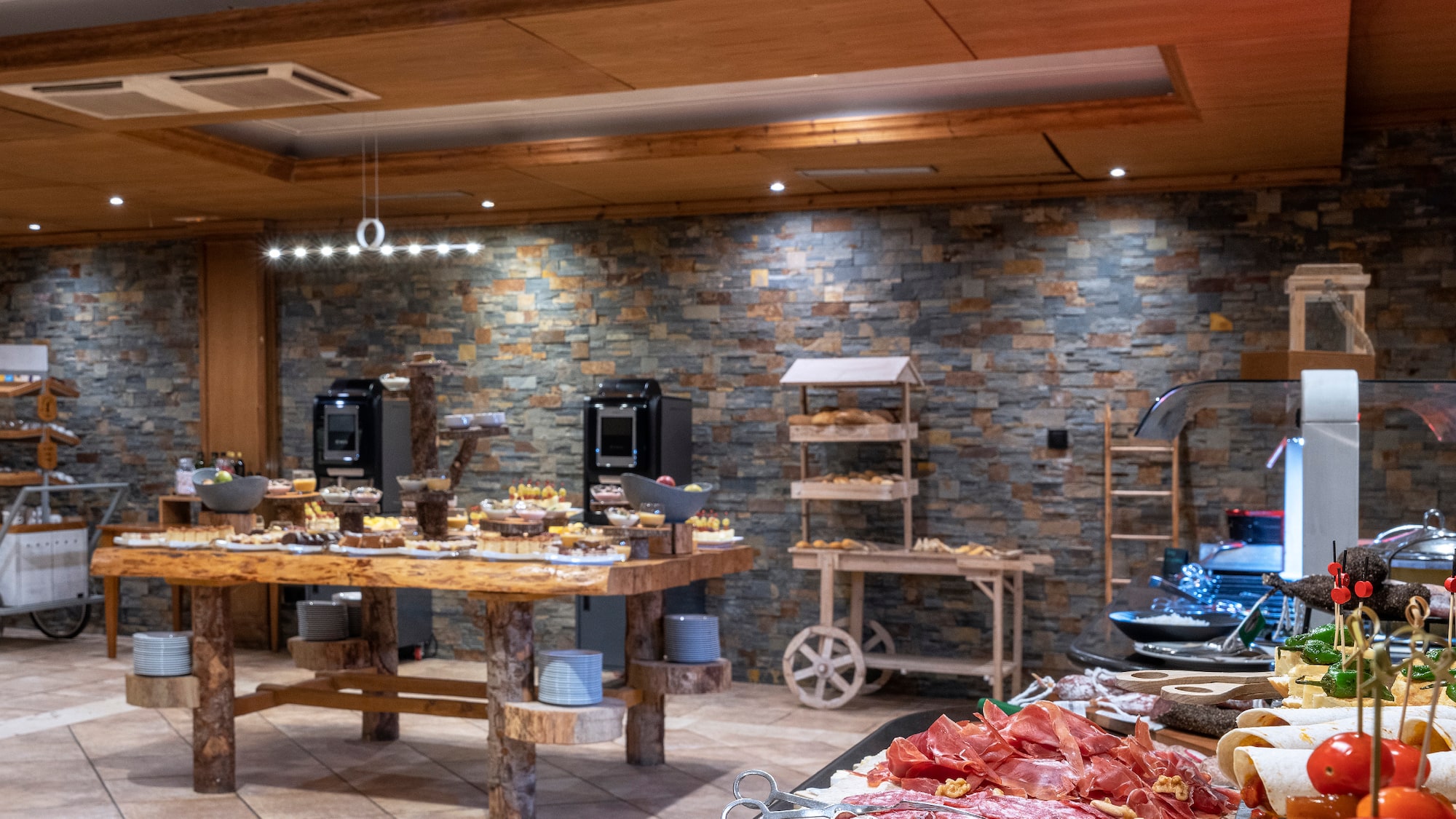 a large room with food and a large table
