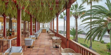 a restaurant with tables and chairs