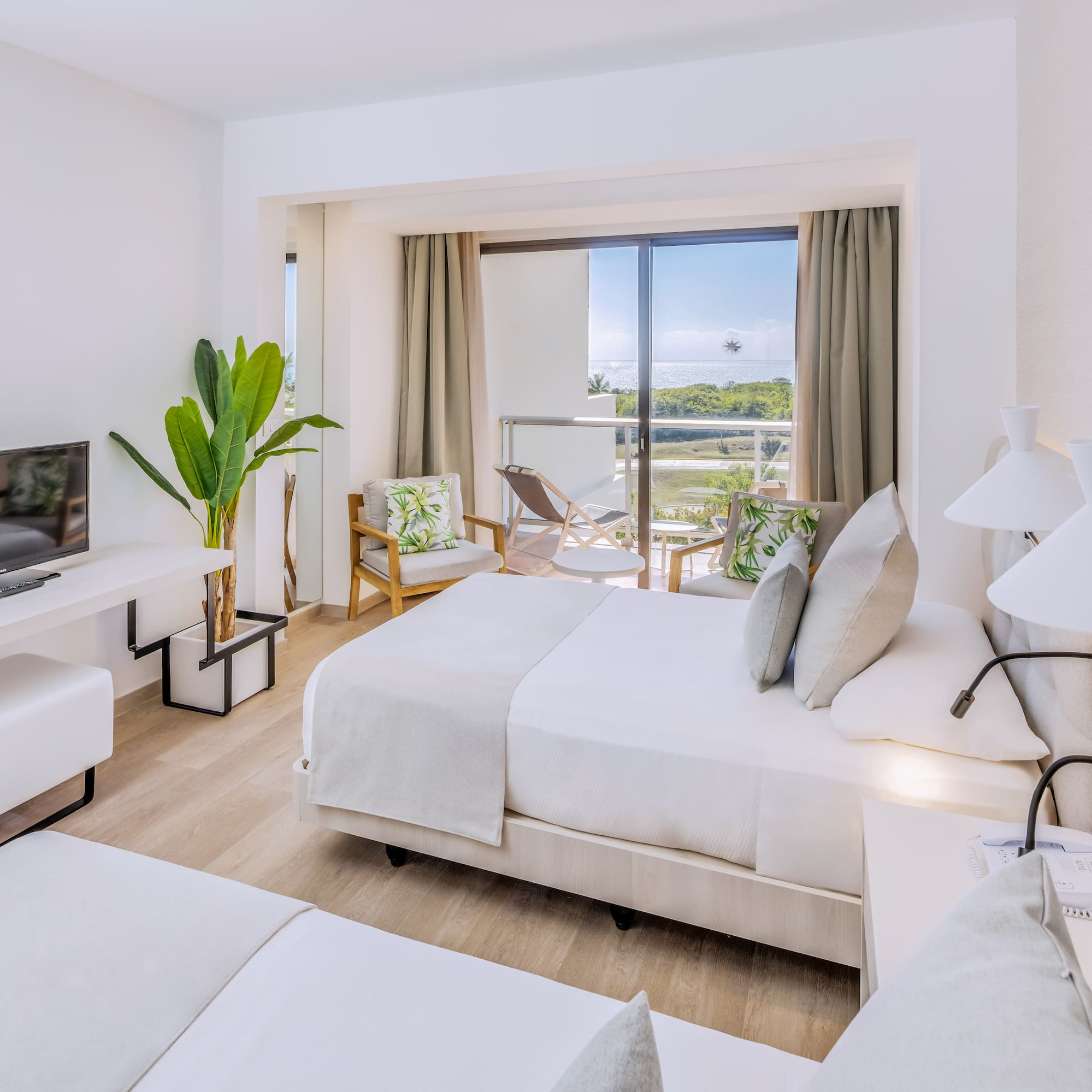 a room with a television and a bed