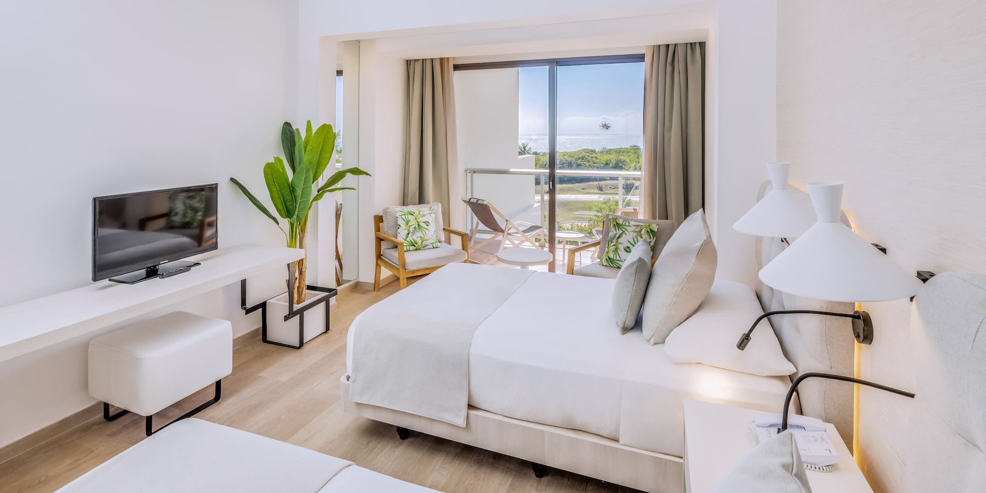 a room with a television and a bed