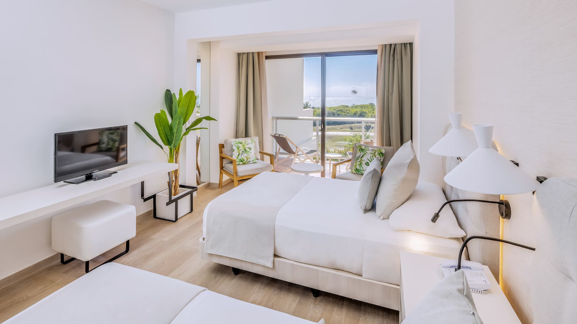 a room with a television and a bed