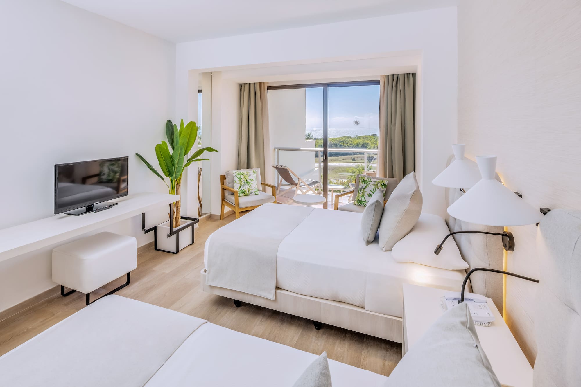 a room with a television and a bed