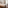 Elegant hotel guest room with twin beds, bright window, and wooden floors.