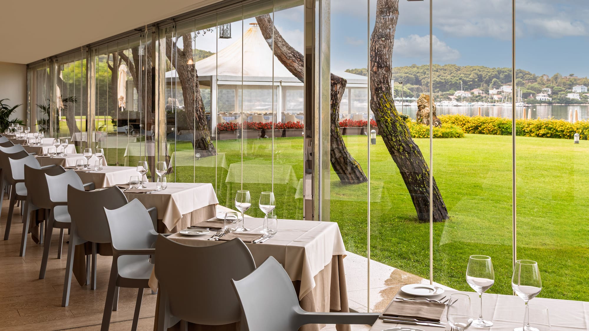 a restaurant with tables and chairs