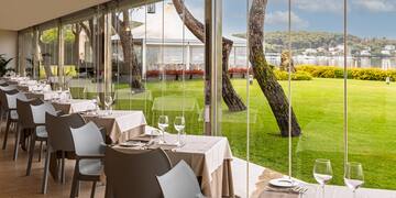 a restaurant with tables and chairs